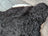 Large soft blacky icelandic sheepskin rug with short wool and white underfur edge perfect cozy home decor