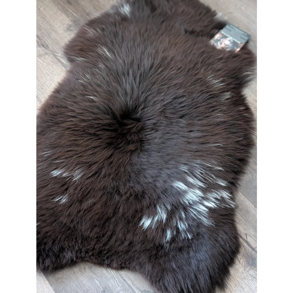 Rare British sheepskin rug, dark brown with silver accents, 47x28in