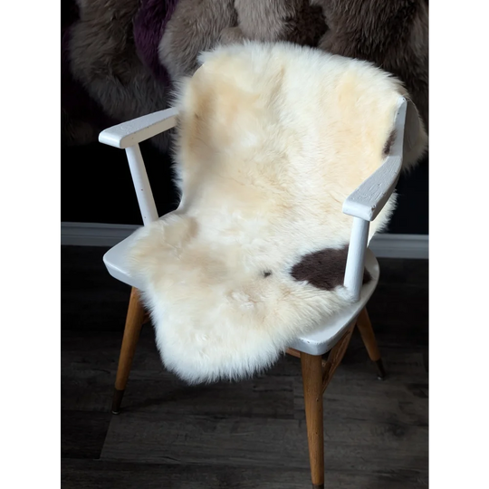 M37 Soft Albanian sheepskin chair cover with Angus Oliver white sheepskin rug