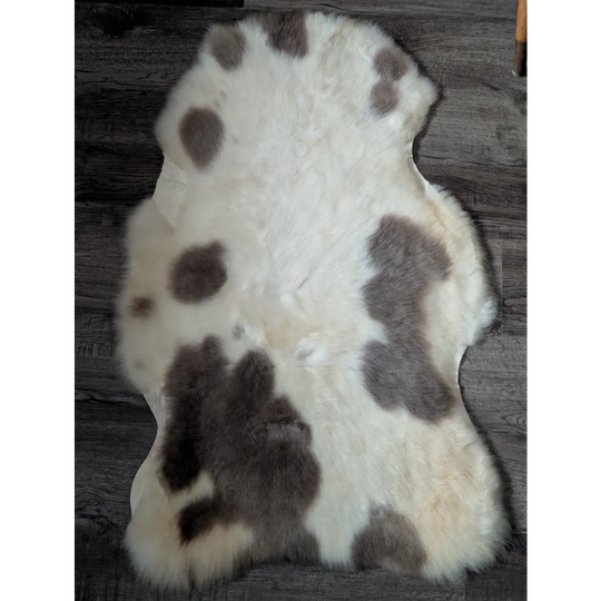 M43 Soft Albanian Sheepskin rug with white and brown cowhide spots