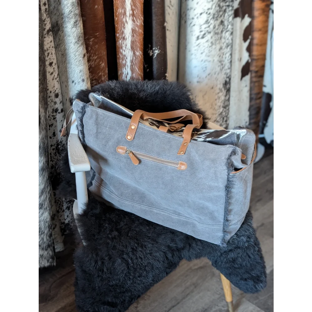 Matty affair canvas hair on weekender bag with gray canvas and tan leather handles