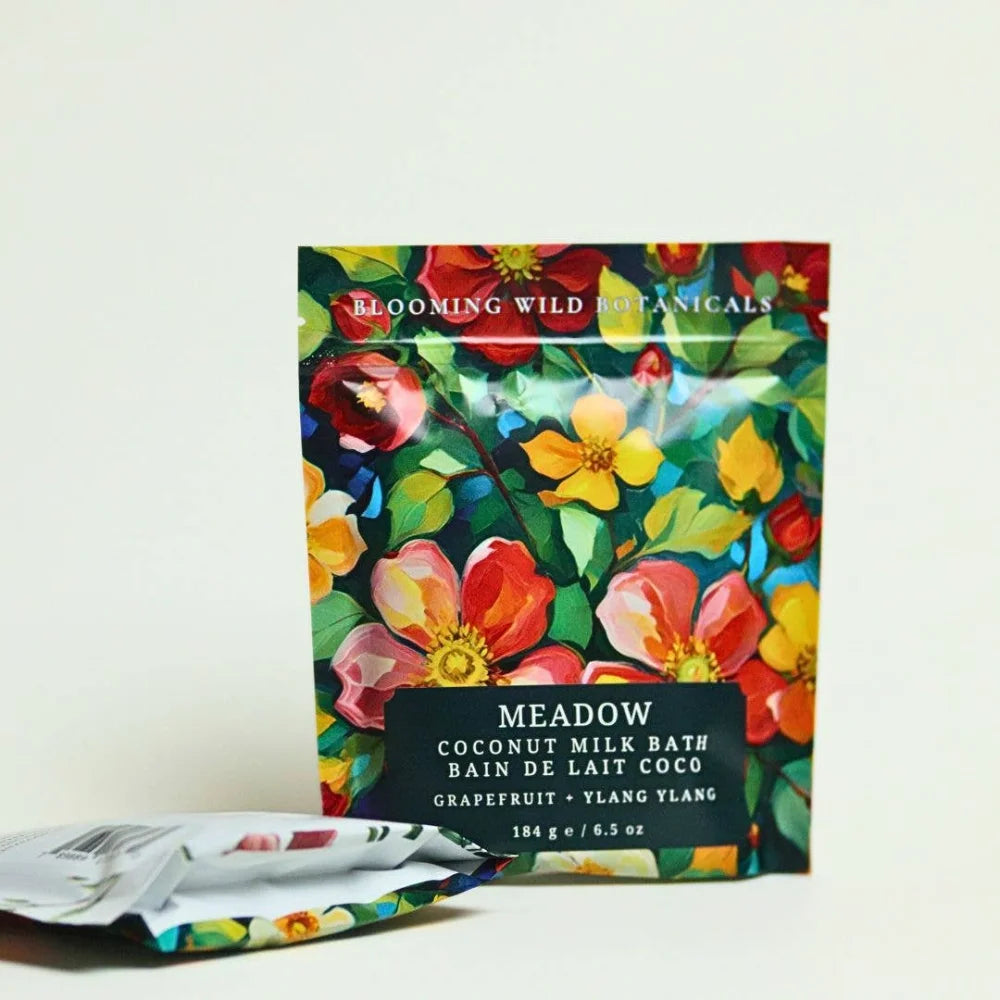 Vibrant coconut milk bath sachet with floral design in grapefruit ylang ylang