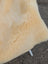 Cream-colored plush extra large washable medical sheepskin cushion with soft fluffy texture for comfort and support