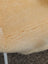 A soft creamy beige medical sheepskin blanket with plush textured surface perfect for medical sheepskins use