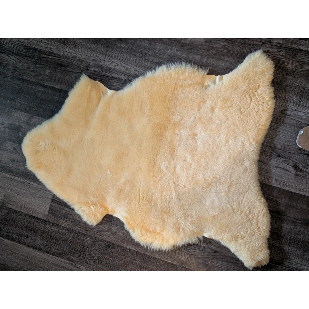 Soft creamy beige large medical sheepskin rug by angus oliver with plush natural fur texture for comfort and care