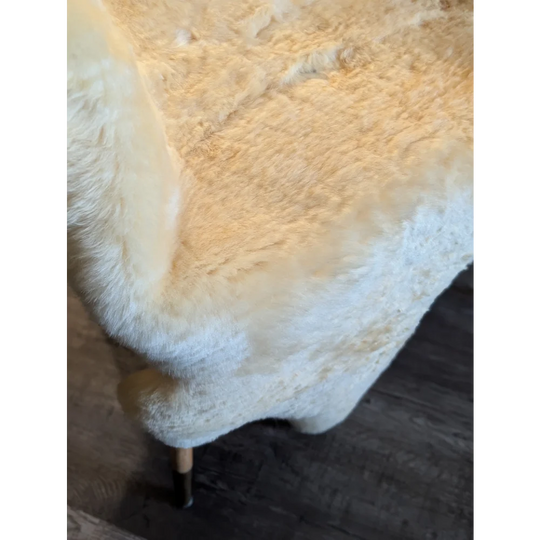 Cream-colored extra large medical sheepskin throw blanket with soft fluffy texture and natural fur pile by angus oliver