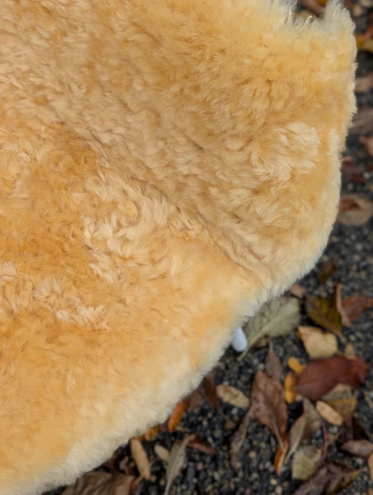 Soft golden brown faux fur hat with plush texture from angus oliver washable medical sheepskin med45 39x20