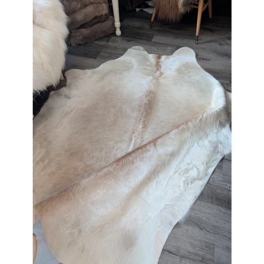 Medium 190 angus oliver large cowhide rug in soft creamy white and beige tones with plush natural fur texture beautiful rugs