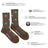 Men’s olive green and brown wool socks with orange axe and tree stump patterns made from rws certified merino wool