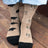 Beige merino wool socks with black bear and tree patterns and solid black toe cap perfect for trekking