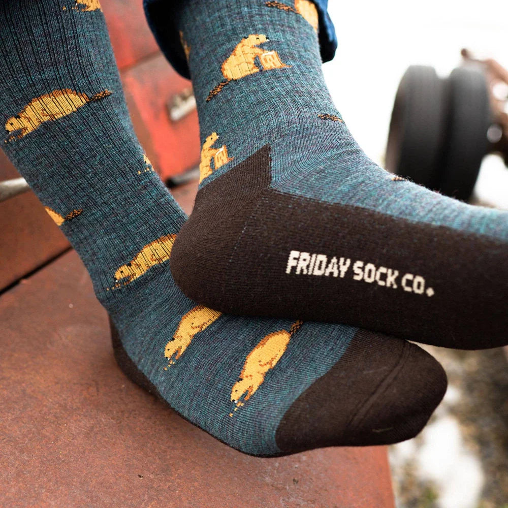 Teal and brown men’s beaver merino wool socks with yellow bear pattern and friday sock co logo on the heel