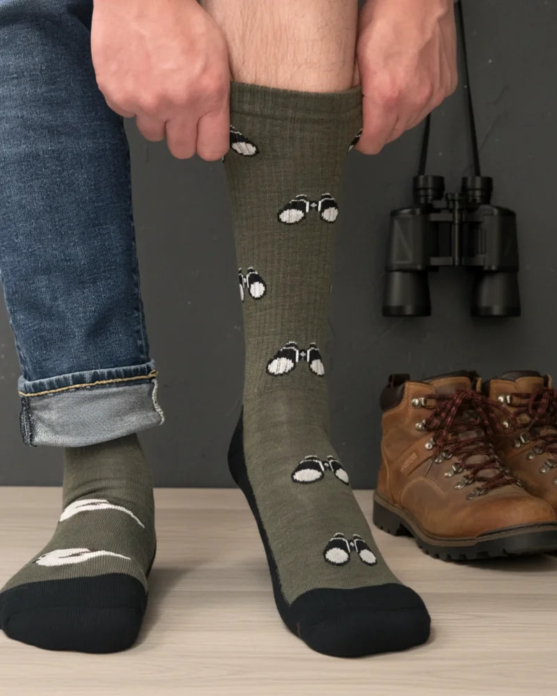 Men’s olive green merino wool socks with white and black binocular print and reinforced black toe cap for birdwatching