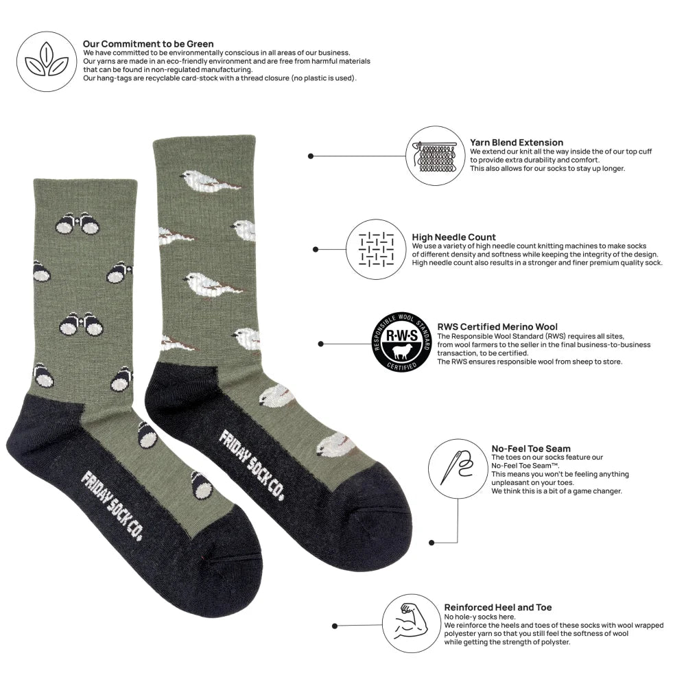 Olive green merino wool socks with white bird patterns black toes and heels featuring friday sock co branding for outdoors