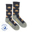 Men’s dark blue merino wool crew socks with pixelated cabin and snow design and gray heel and toe accents