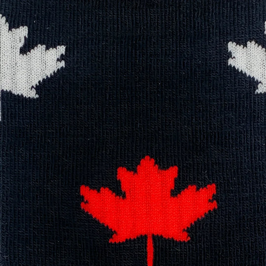 Black merino wool socks with a red maple leaf and white maple leaves for premium soft comfort in men’s wool socks