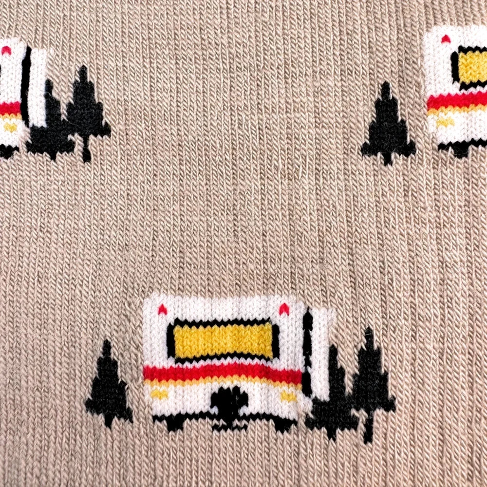 Beige knitted mens classic camper merino wool socks with playful white yellow red rvs and black pine trees pattern