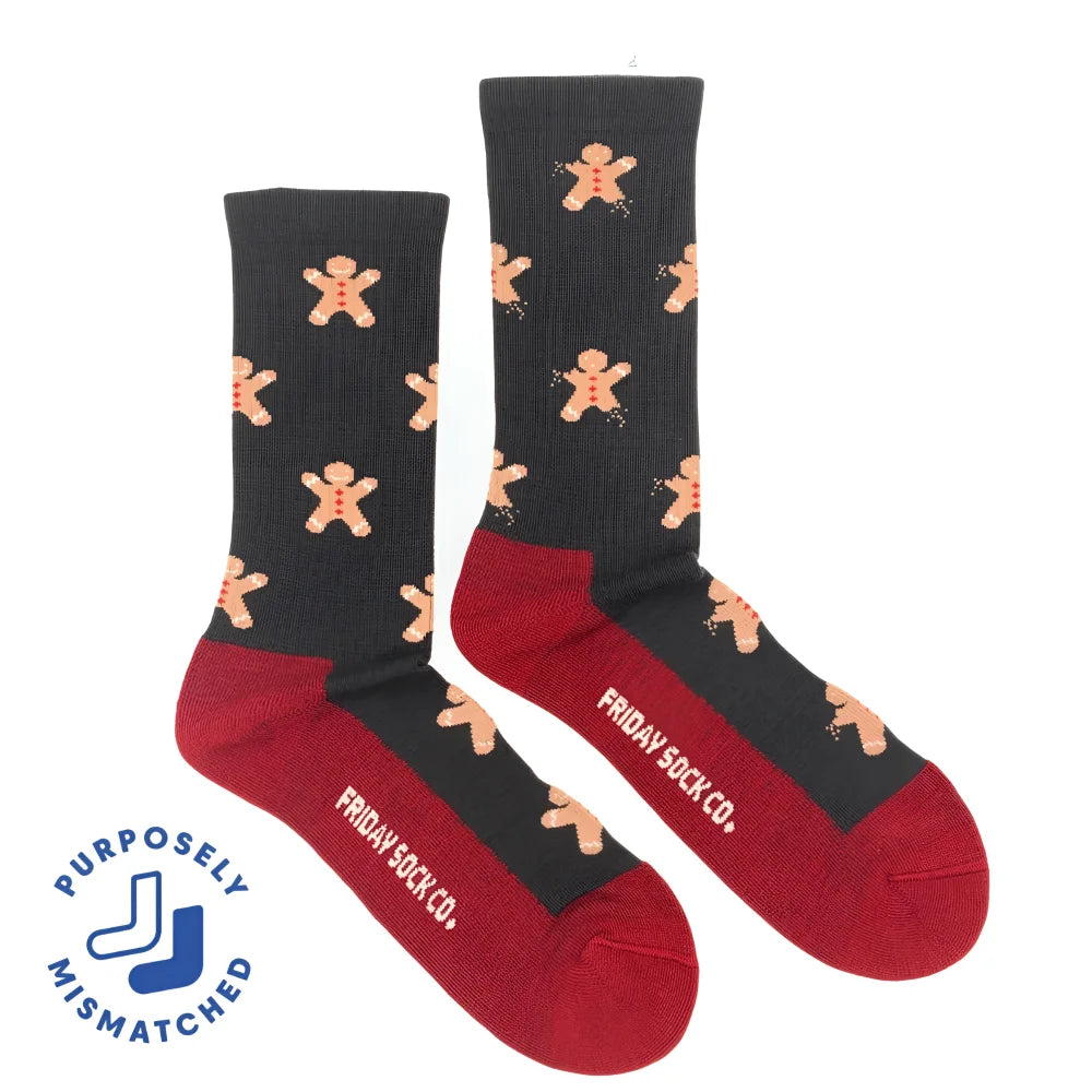 Men’s gingerbread bite merino wool socks by friday sock co black and red wool socks with gingerbread men pattern