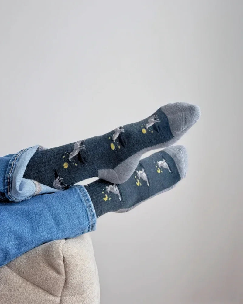 Men’s wolf and moon dark blue merino wool socks with white yellow star pattern and gray toe caps for warmth and breathability