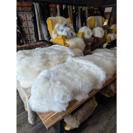 Oeko tex certified very soft merino double sheepskin rug on wood table
