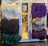 Plush merino sheepskins dyed colors in white black teal purple and beige displayed as chair pads on shelves