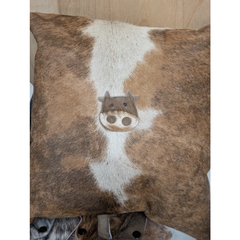 Brown and white cowhide mini moo cushion by angus oliver canada with stitched cow face appliqué double sided pillow