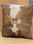 Mini moo double sided cowhide cushion with brown and white cowhide and stitched-on cow face from angus oliver canada