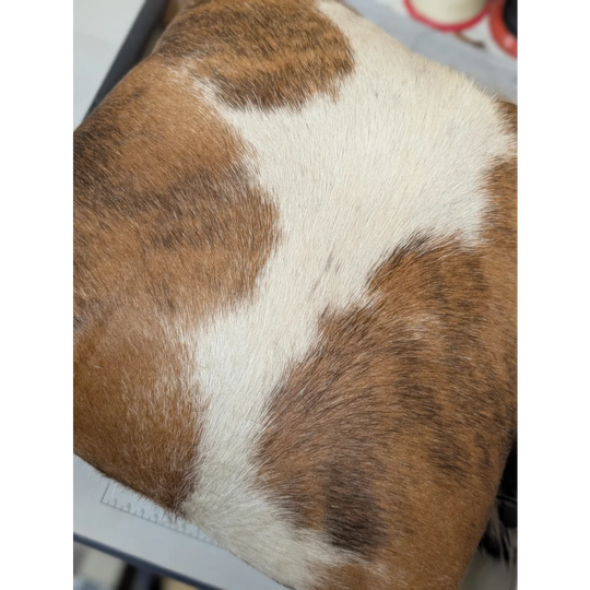 Brown and white mini moo double sided cowhide cushion with natural fur texture by angus oliver canada