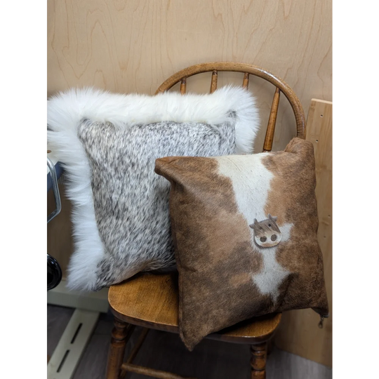Brown and white cowhide mini moo cushion with stitched cow face design by angus oliver canada