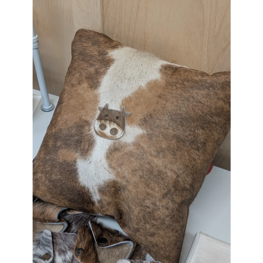 Brown and white cow print mini moo throw pillow with stitched cow face appliqué by angus oliver canada