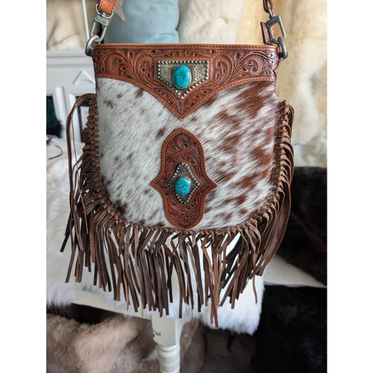 Mojave tassel bag in brown speckled cowhide with fringe and turquoise inlays