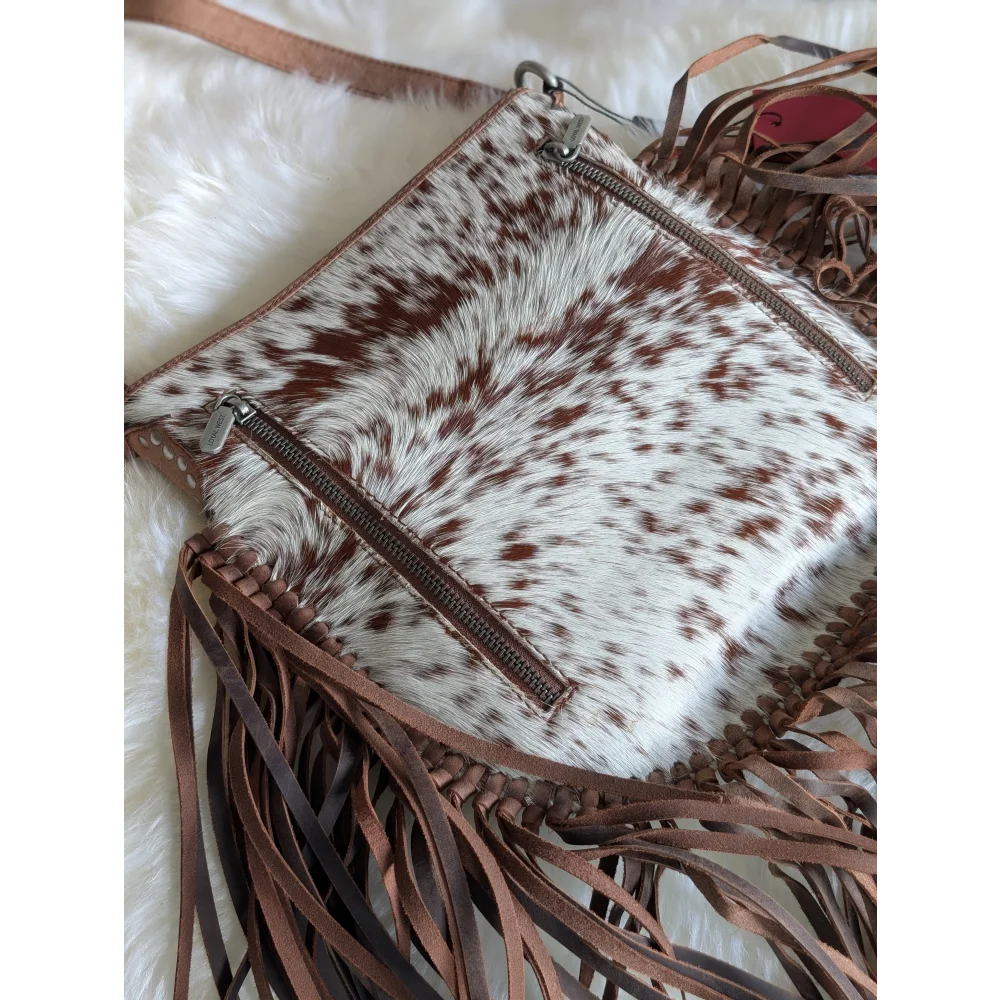 Mojave tassel bag in brown speckled cowhide with fringe details