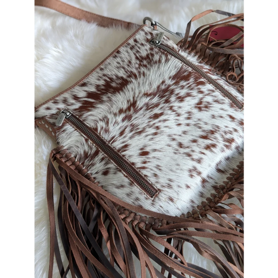 Mojave tassel bag in brown speckled cowhide with fringe details