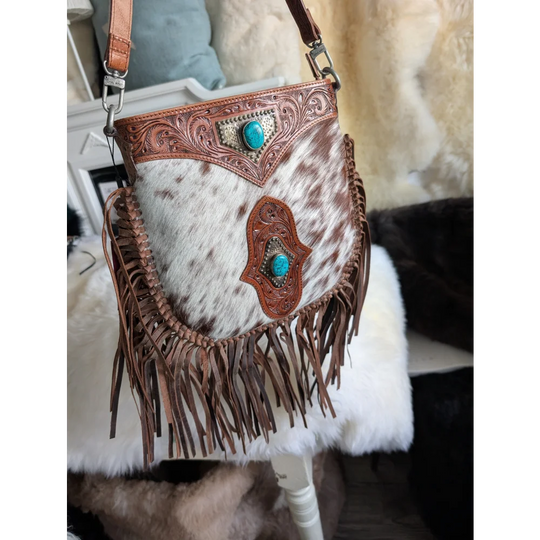 Mojave tassel bag in brown speckled cowhide with turquoise accents