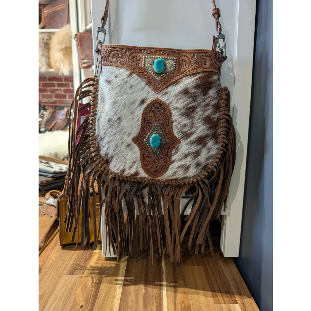 Mojave tassel bag in brown speckled hunter leather with turquoise accents