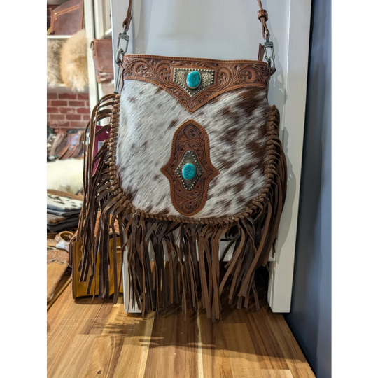 Mojave tassel bag in brown speckled hunter leather with turquoise accents