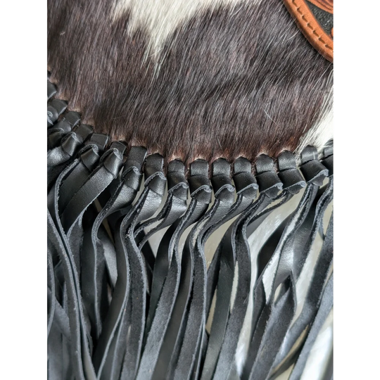 Mojave tassel bag with black hunter leather fringe on cowhide fur top