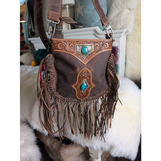 Mojave tassel bag in hunter leather with turquoise accents, fringe
