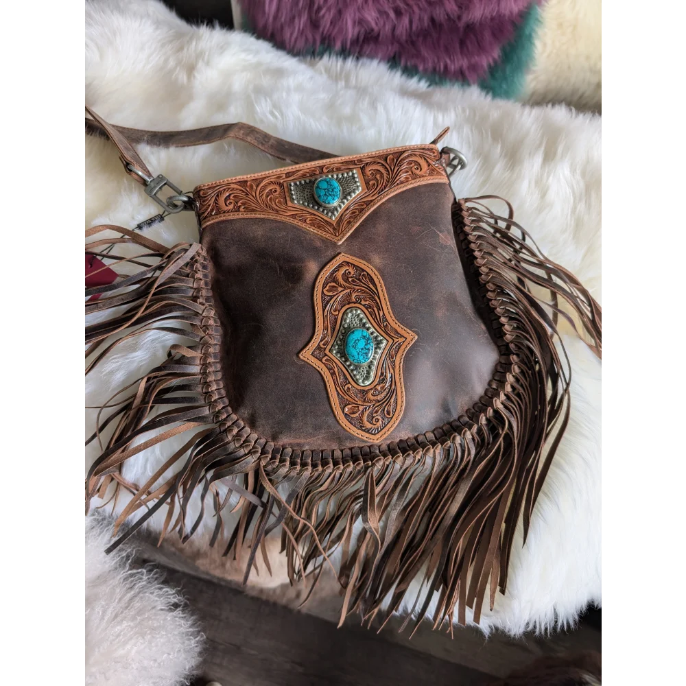 Mojave tassel bag in brown hunter leather with fringe and turquoise accents