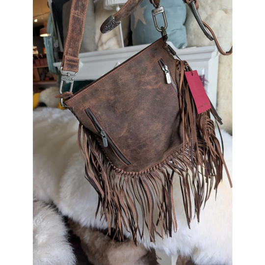 Mojave tassel bag in hunter leather with brown fringe and silver zippers
