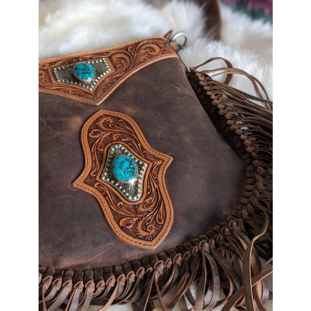 Mojave tassel bag in hunter leather with turquoise stones and fringe
