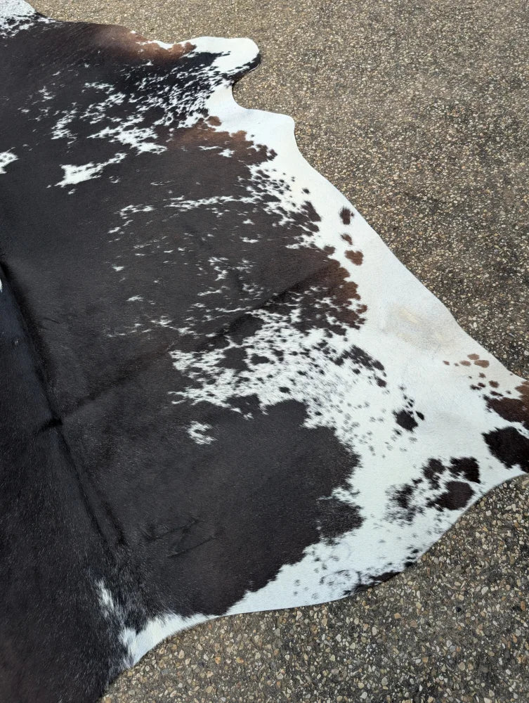 Moon1 massive 96x82 large cowhide rug with black white and natural brown patches showing unique characteristics