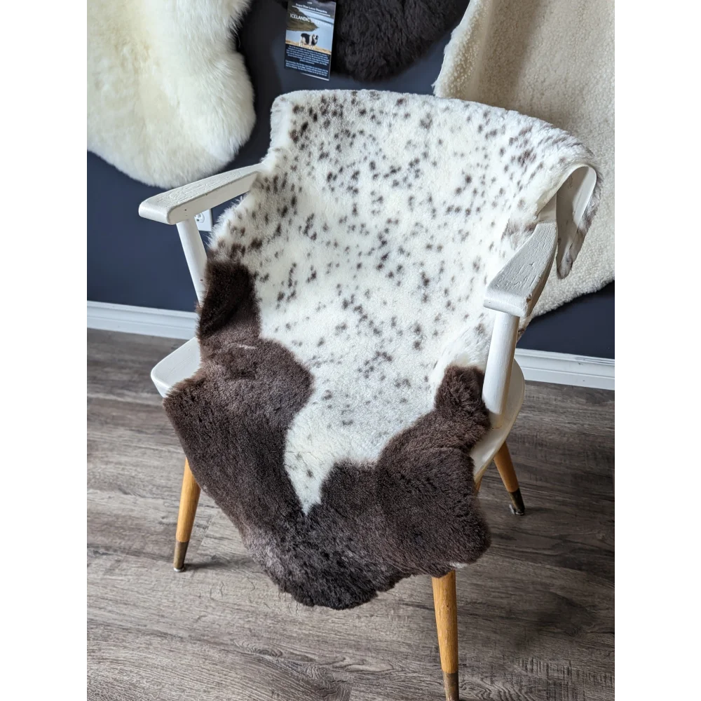 Gorgeous merino sheepskin cowhide throw with brown white spots