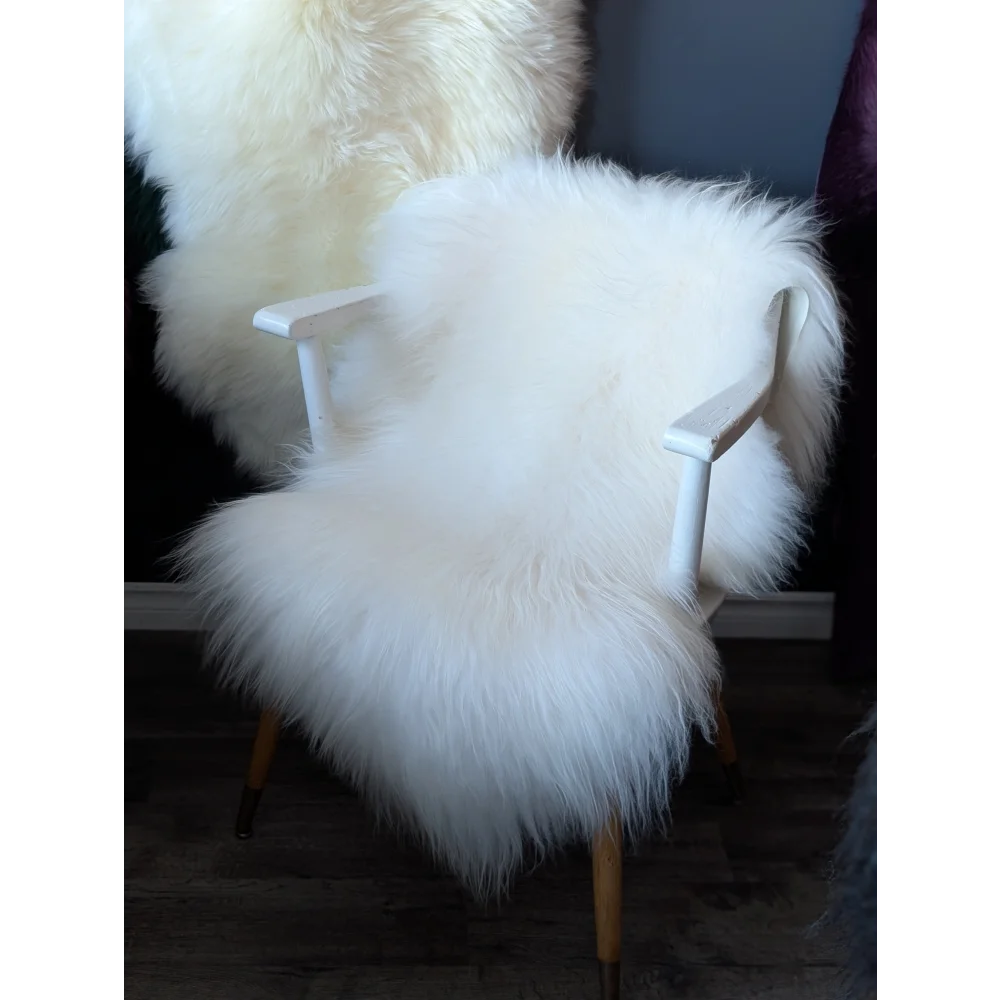 Modern white fur Icelandic sheepskin chair with wooden legs