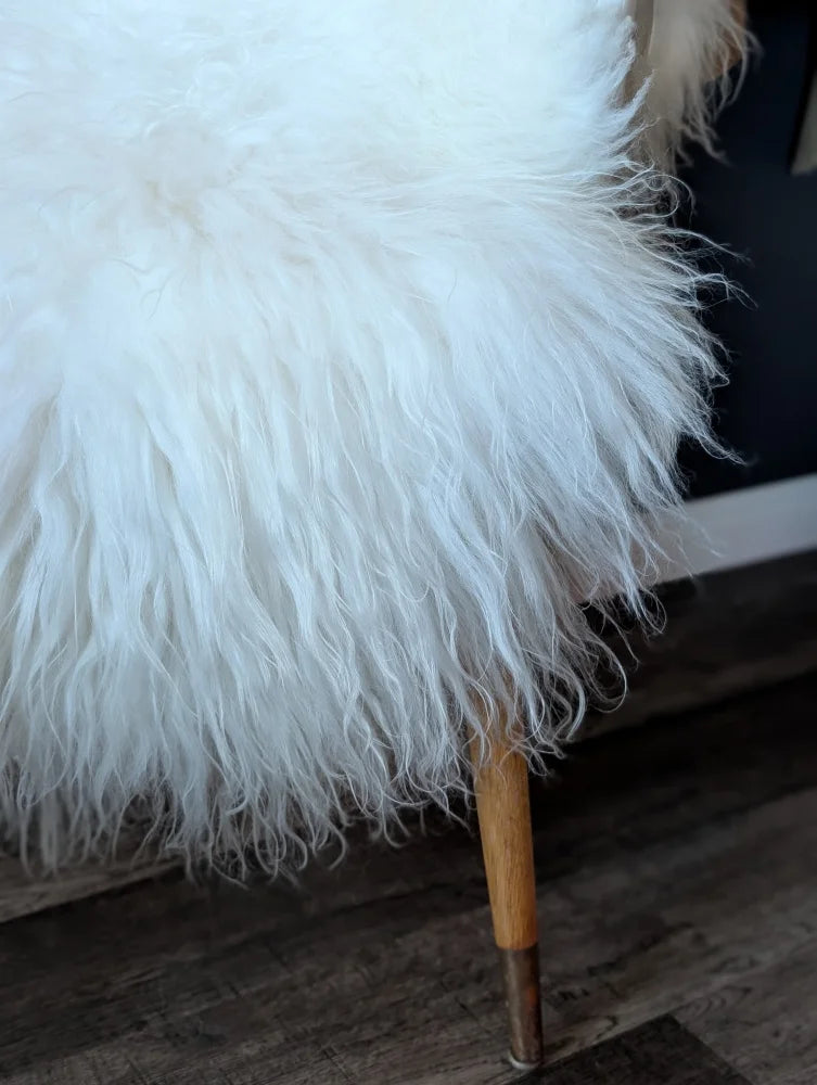 Natural white icelandic sheepskins fluffy wool icelandic chair with wooden legs and brass caps