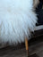 Natural white icelandic sheepskins fluffy wool icelandic chair with wooden legs and brass caps