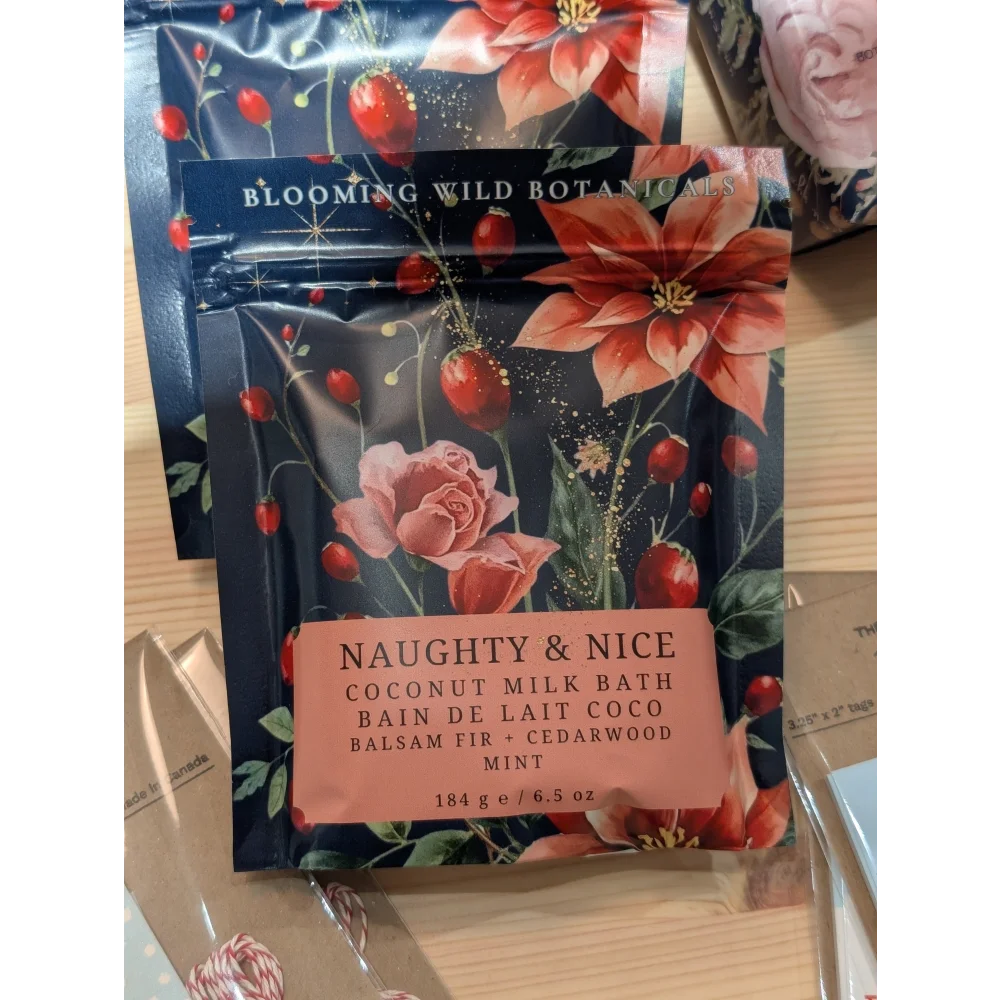Naughty & Nice coconut milk bath salt sachet with blooming wild botanicals, fir and mint