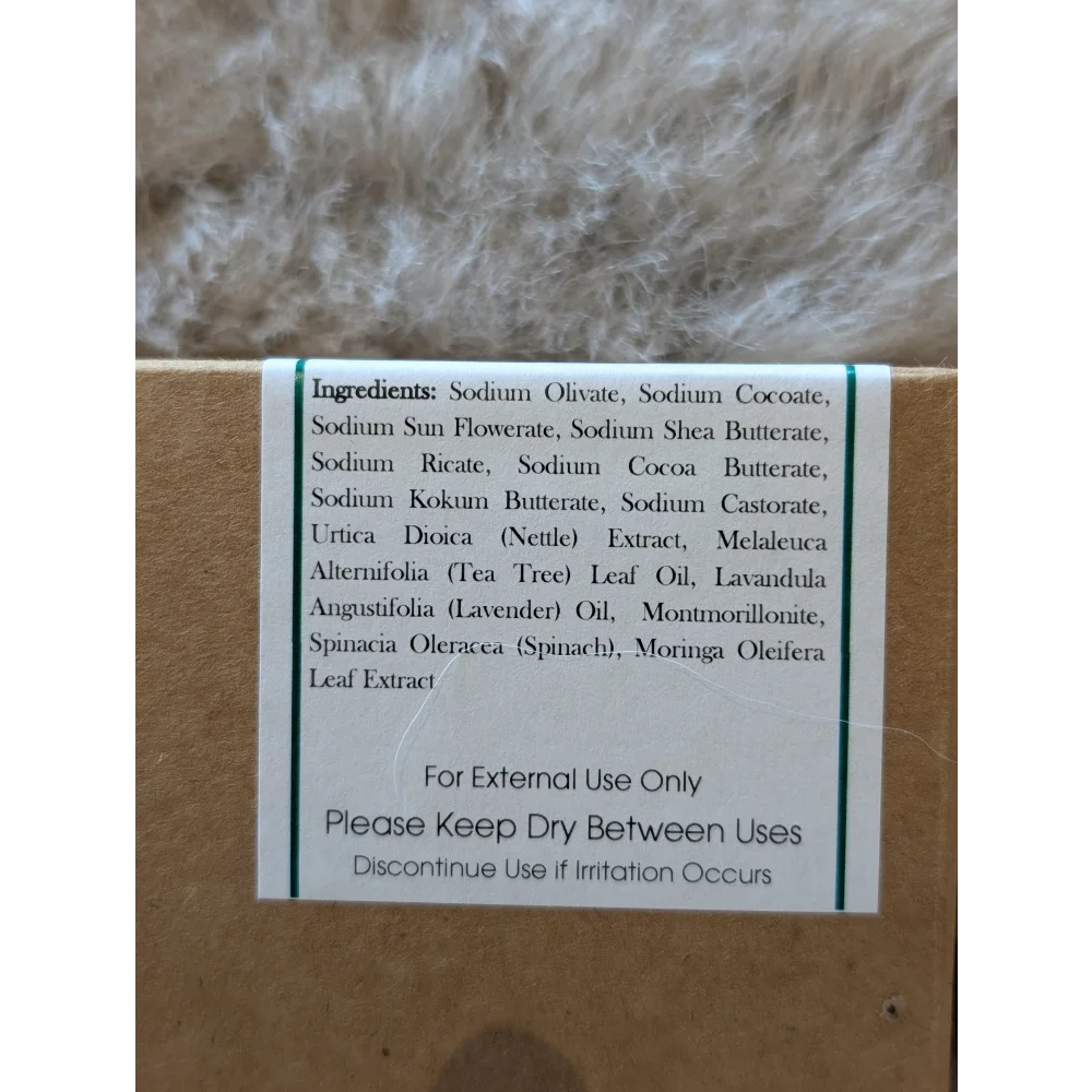 Nettle and tea tree soap bar in brown box with green ingredients