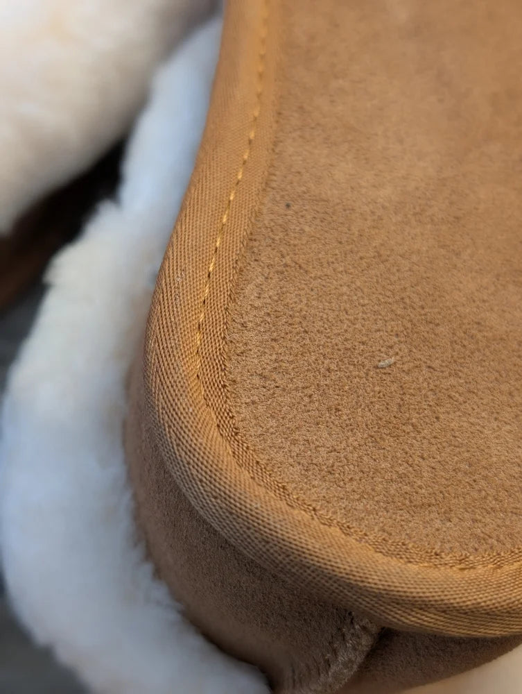 Tan suede slip-on ultimate sheepskin slippers with cozy white shearling lining for indoor comfort