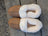 Tan suede slip-on sheepskin slippers with plush white shearling lining for ultimate sheepskin comfort