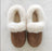 Brown suede slip-on sheepskin slippers with plush white shearling lining for cozy fall comfort
